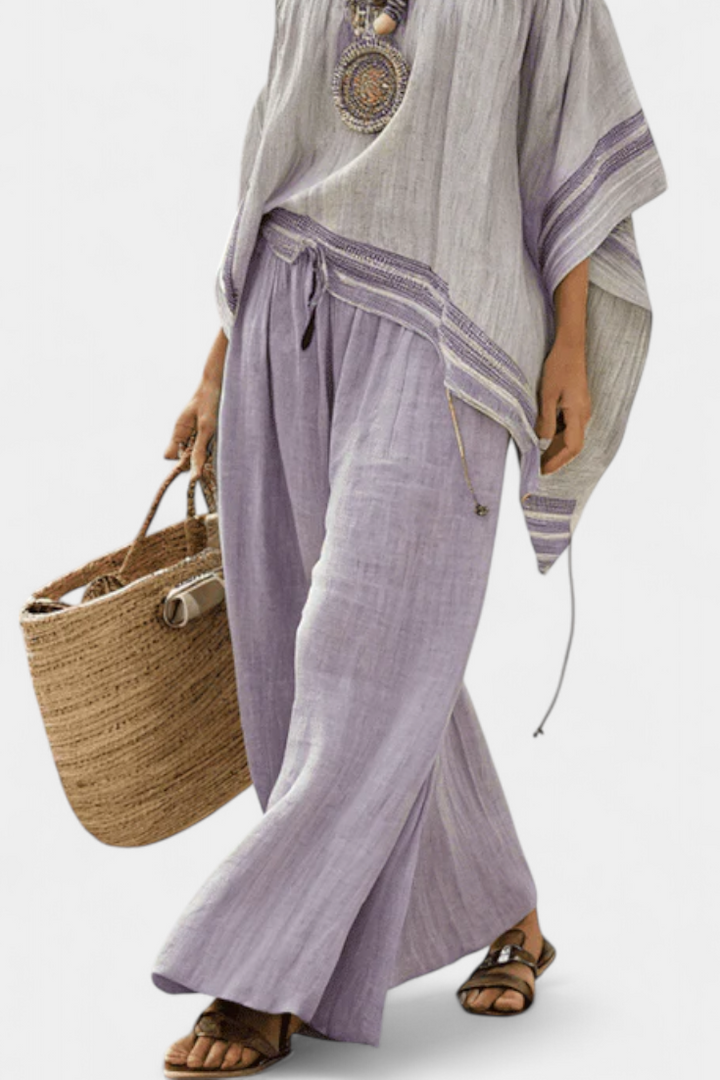 Noelle | Elegantna Off-Shoulder Majica i Široke Prugaste Pantalone